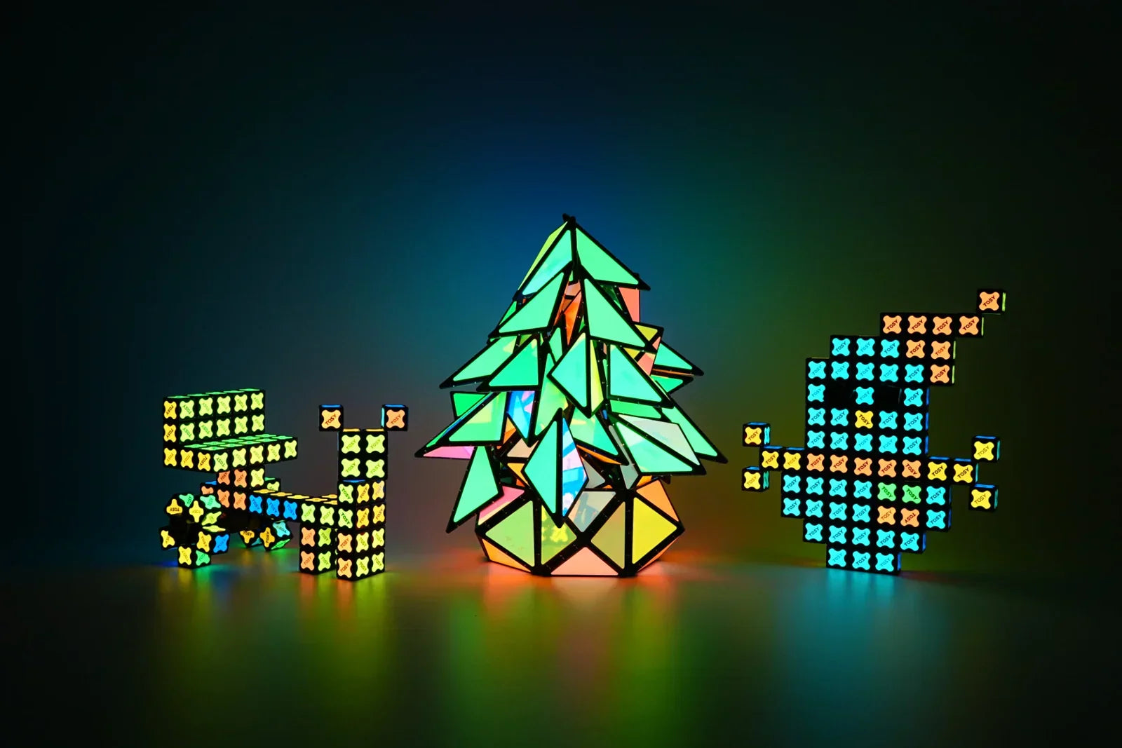 Creative Christmas shapes made with TOSY magnetic pyramid and magnet cube, fun holiday building activity