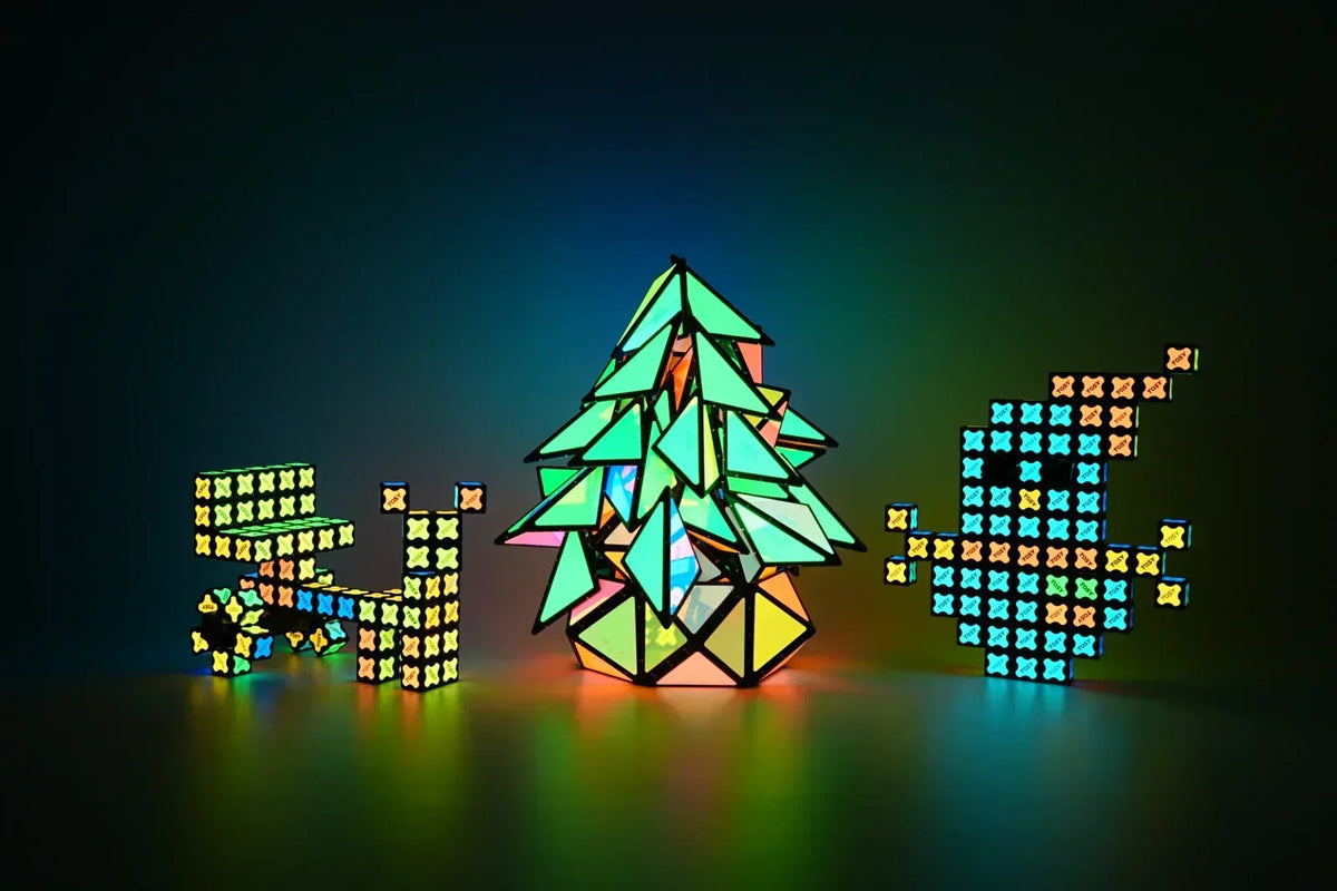 Creative Christmas shapes made with TOSY magnetic pyramid and magnet cube, fun holiday building activity