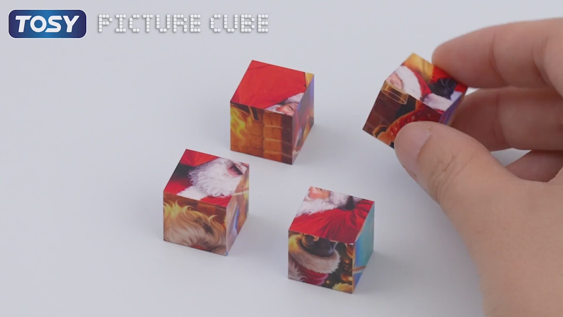 Load video: TOSY Picture Cube Playful Santa magnetic puzzle video showcasing 6-in-1 image transformation and room decoration display