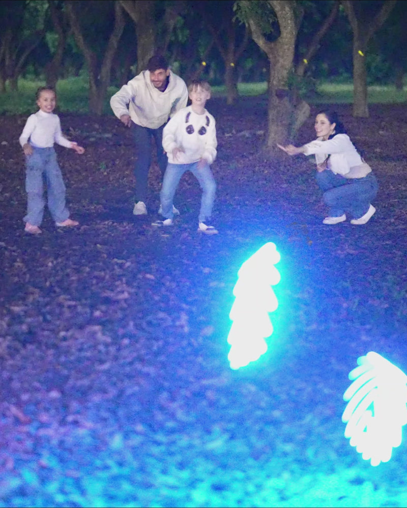 TOSY Flying Ring family outdoor game in the park and backyard, featuring easy catches and active play for all ages.